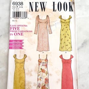 May include: A New Look sewing pattern envelope 6938 for five dress variations in one. The front cover displays illustrations of five different dress styles in various colors and patterns, including floral and solid designs, with size A 6-16.