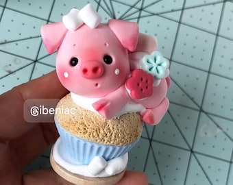The Little Piglets clay figurines
