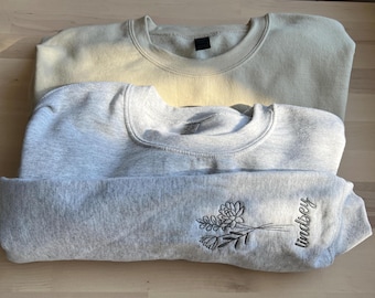 Personalized Birth Flower Sweatshirt with Custom Name on Sleeve, Embroidered Botanical Crewneck, Custom Floral Name Birth Month Sweater