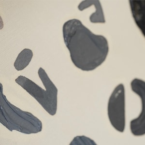 May include: Abstract art painting with gray shapes on a white background. The shapes are various sizes and include circles, semi-circles, and irregular shapes.