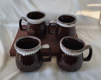 Juego de 4 tazas de gres vintage con acabado de esmalte marrón espejo con efecto goteo.