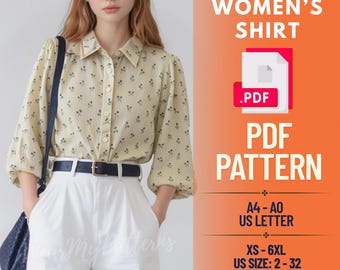 May include: A beige button-down shirt with a small blue floral pattern, paired with white shorts and a black belt. The image includes text that says "WOMEN'S SHIRT PDF PATTERN" and size details.