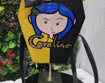 Coraline coffin-style backpack and handbag