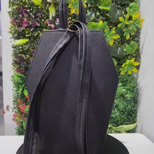 Coraline coffin-style backpack and handbag image 9