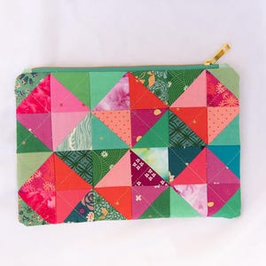 big scrappy Christmas patchwork zipper pouch