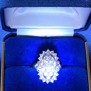 Ladies Sterling Silver 3.25 carat cubic zirconia cluster statement ring shipped in a blue velvet ring box. Great Gift!!!