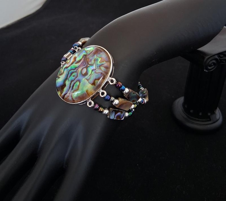 Collana, bracciale e orecchini in abalone immagine 6