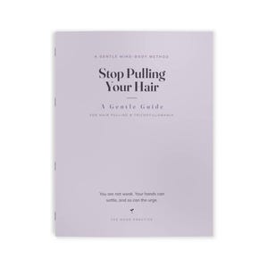 May include: A light lavender softcover book titled Stop Pulling Your Hair: A Gentle Guide for Hair Pulling & Trichotillomania. The cover features the text A Gentle Mind-Body Method, and the phrase You are not weak. Your hands can settle, and so can the urge. The Good Practice is printed at the bottom with a small sprout icon.