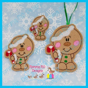 May include: Three gingerbread man ornaments with candy canes. The largest ornament is a hanging ornament with a green ribbon. The two smaller ornaments are flat and have a white background.
