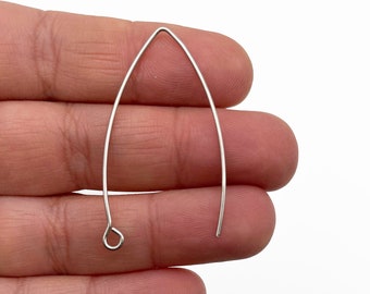May include: Silver earring finding with a teardrop shape and a small loop at the bottom.