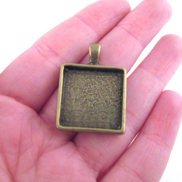 Four 20mm square bezel pendant settings, brass plated, B234