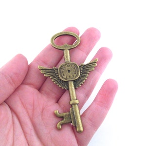 Huge 78mm focal point antique brass skeleton key pendant, Bronze winged watch clock charms, 78x46mm, pick your amount, D190