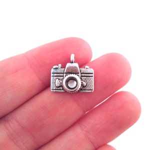 12 camera charms, silver plated, 15x14mm, D91