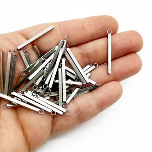 Dziesięć zawieszek prętowych ze stali nierdzewnej o wymiarach 28 x 2 mm, długie zawieszki prętowe, A205