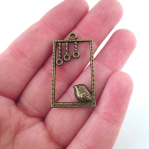 8 Bird in window brass 34mm pendants, bronze charms 34x19mm, D222