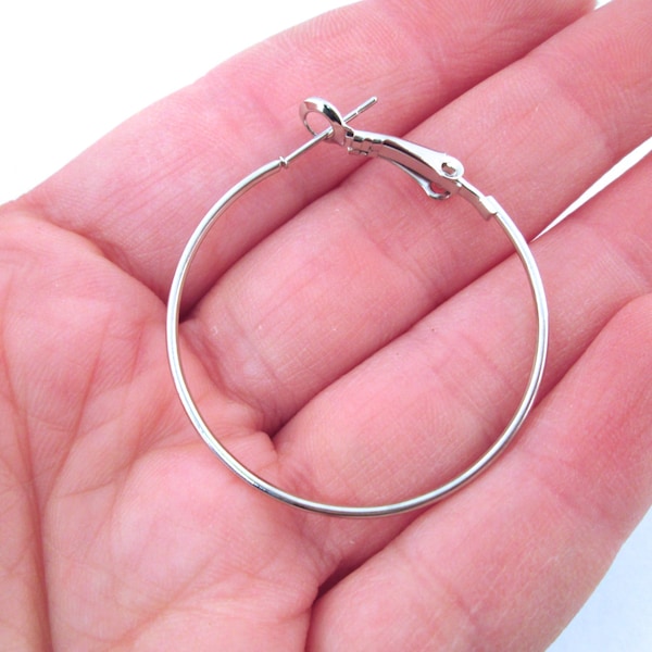 6 pair 35mm hoop earrings, silver plated with a spring clasp  C58