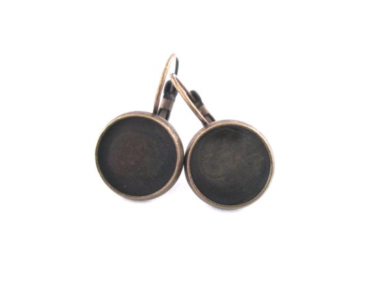 Orecchn con petre marron e nere | Orecchn, Goell, Petre Orecchn con petre marron e nere | Orecchn, Goell, Petre