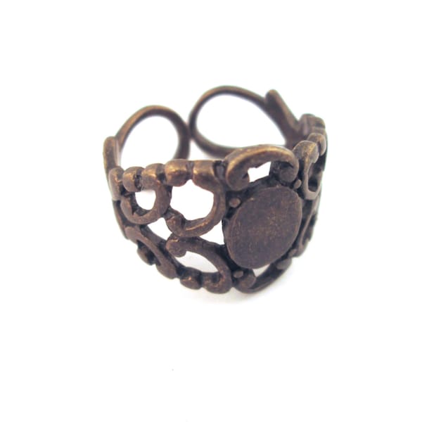 Brass filigree rings, with a 6x8mm glue on pad, pick your amount, A200