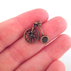 Antique red copper old fashioned bicycle charms, penny farthing pendants pick your amount, D78