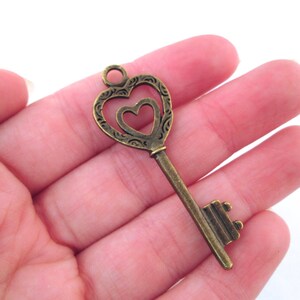 6 or 12 antique brass plated 50mm heart skeleton key pendants, bronze charms, pick your amount, 50x28mm, D161
