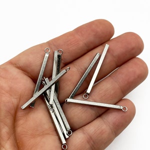 Dziesięć 33 mm zawieszek ze stali nierdzewnej, 33 x 2 mm zawieszki z długim prętem, A250