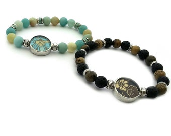 2 Beaded Bracelets in Mermaid Blue and Black and Gold Blossom