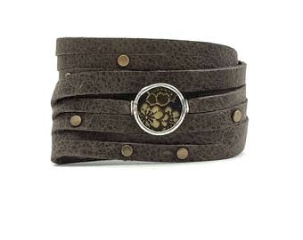 Shi Bandit Cuff: Gray Leather Wrap Cuff with Brass Studs and Silk Charm