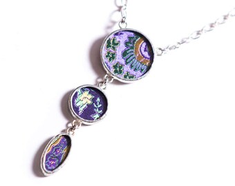 Shi Studio Trio Necklace in Silk Brocade behind Glass