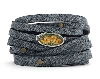 Soft Leather Cuff with sparkly gold sequin Shi piece and antique brass studs.