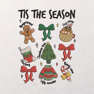 May include: Embroidered design with the text "TIS THE SEASON" and Christmas-themed icons: gingerbread man, green bow, hot cocoa, stocking, Christmas tree, red bow, ugly sweater, and candy cane. The design is on a white background.