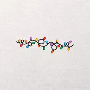 May include: Embroidered string of colorful Christmas lights in red, orange, yellow, green, blue, and purple. The lights are strung on a black wire. The design is on a white background.