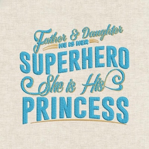 May include: Embroidered text on a beige fabric reads "Father & Daughter, He is Her Superhero, She is His Princess" in blue and gold thread. The design is likely for a decorative item or apparel, celebrating the bond between a father and daughter.