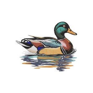 May include: An embroidered mallard duck design featuring a vibrant green head, a yellow beak, and a body with detailed plumage in shades of brown, blue, white, and tan, shown floating on water with a stylized reflection below the duck.