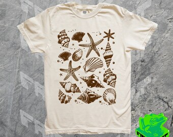 Camiseta vintage de tatuaje de concha marina de los años 90, camiseta gráfica retro art ocean, vida marina, camisa de surf de playa costera, Cottagecore, hippie, boho, regalo para ella