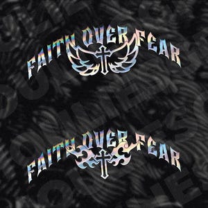 May include: Two holographic stickers with the phrase "FAITH OVER FEAR" in a stylized font. Each sticker features a cross with wings. The background is a dark, textured pattern.