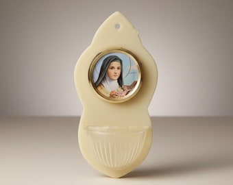 Plastic holy water font (bénitier) with medallion of Saint Thérèse of Lisieux
