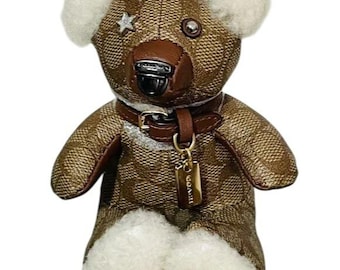 coach bear backpack Bag Charm In Signature Canvas Leather Signature coated canvas and smooth leather Attached hinged split key ring 3 1/2 (L) x 4 (H) Style No. NWT Coach bear bag charm