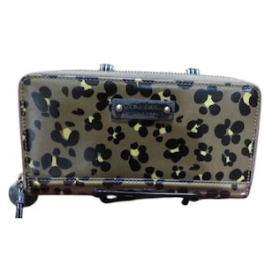 May include: A rectangular wallet with a zipper closure, featuring a brown background with a black and yellow floral pattern. The wallet has a small, rectangular black label with silver hardware.