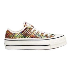May include: White platform sneakers with a colorful woven textile upper. The low-top shoes have white laces, a white rubber toe cap, and a black stripe along the sole. The shoes are a size 8.