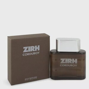 May include: A brown rectangular box and a brown perfume bottle with a silver cap. The box and bottle both have the text "ZIRH CORDUROY" printed on them. The bottle is labeled "EAU DE TOILETTE SPRAY 75 ml 2.5 US FL OZ."