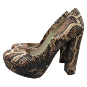 May include: A pair of platform high heels with a snakeskin pattern in shades of brown, tan, and black. The heels have a thick, block heel design and a rounded toe.