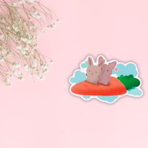 Adorable Bunnies on Carrot Adventure Vinyl Die-Cut Sticker - Cute and Durable for Laptops, Journals, and More