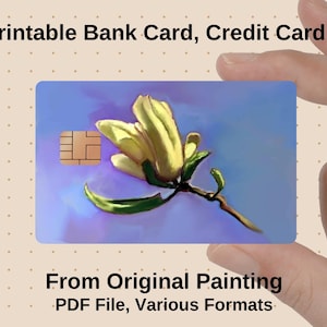 May include: A white ceramic mug with a black handle and the text "But First, Coffee" in a handwritten style. The mug is on a white surface. The mug is approximately 4 inches tall.