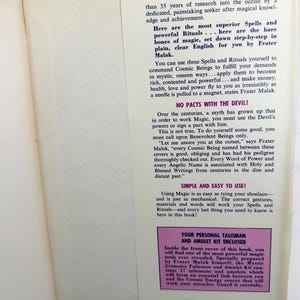 May include: Open book page with text about spells, rituals, and magic by Frater Malak. The text includes phrases like "Cosmic Beings," "Talisman and Amulet Kit," and "Parker Publishing Co." The book is printed in the United States of America.