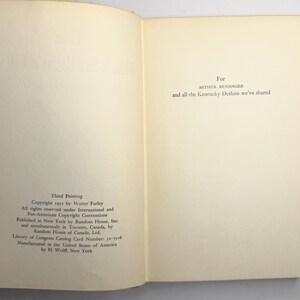 May include: Open book pages with text. The left page reads "Third Printing Copyright 1953 by Walter Farley" and other publishing details. The right page reads "For ARTHUR BENSINGER and all the Kentucky Derbies we've shared."