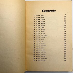 May include: Open book page with the title "Contents" in a stylized font. The page lists numbered chapter titles such as "BLACK FIRE," "BLACK GOLD," and "BLACK ANGEL," with corresponding page numbers. The paper has a yellowed, aged appearance.