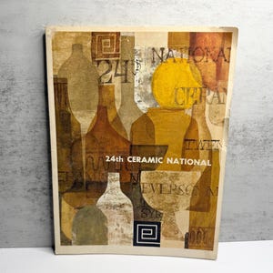 May include: A rectangular exhibition catalog cover featuring a layered collage of brown, tan, and yellow bottle and vessel silhouettes. The text reads 24th CERAMIC NATIONAL, EVERSON, and SYR, with a small black square logo containing a white geometric shape.
