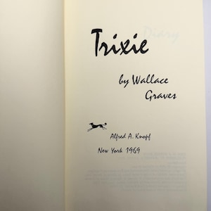 May include: An open book page displaying the title "Trixie" by Wallace Graves. The page includes the publisher's name, Alfred A. Knopf, and the year of publication, 1969, in black ink. A small illustration of a running dog is also present.