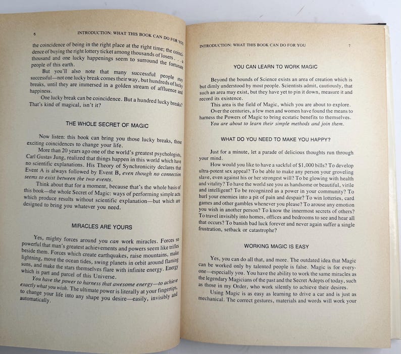 May include: Open book pages with text about magic and miracles. The text includes phrases like "The Whole Secret of Magic" and "Miracles Are Yours". The pages are yellowed with age.