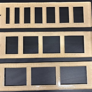 Könnte beinhalten: Drei transparente Plastikrahmen mit rechteckigen Öffnungen in verschiedenen Größen. Die Rahmen sind mit "Pocket Templates" beschriftet.